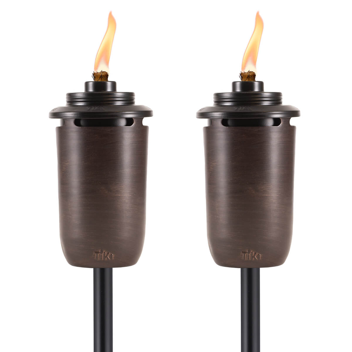 Pair of bronze TIKI torches with visible flames, designed for outdoor lighting and ambiance.