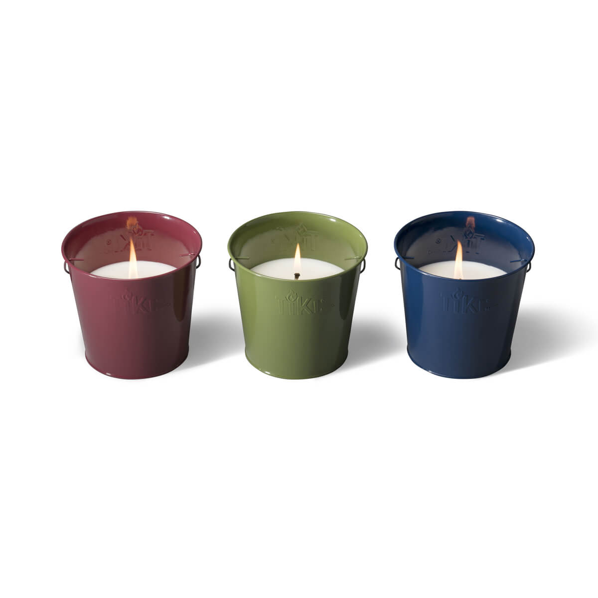 Three lit TIKI® citronella candles in red, green, and blue metal buckets, designed for outdoor use.