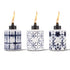 Three ceramic TIKI torches with blue and white geometric patterns, each lit with a visible flame, on a white background.