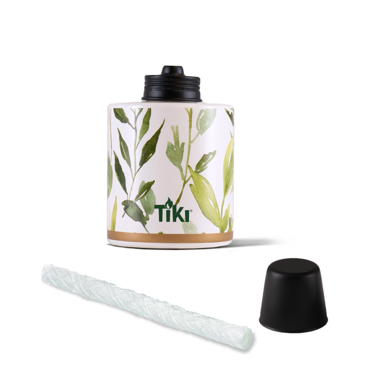 TIKI-brand tabletop torch fuel canister with leafy design, replacement wick, and black cap, shown on white background.