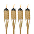 Four natural bamboo TIKI torches with woven design, each lit with a bright flame. Ideal for outdoor ambiance and lighting.