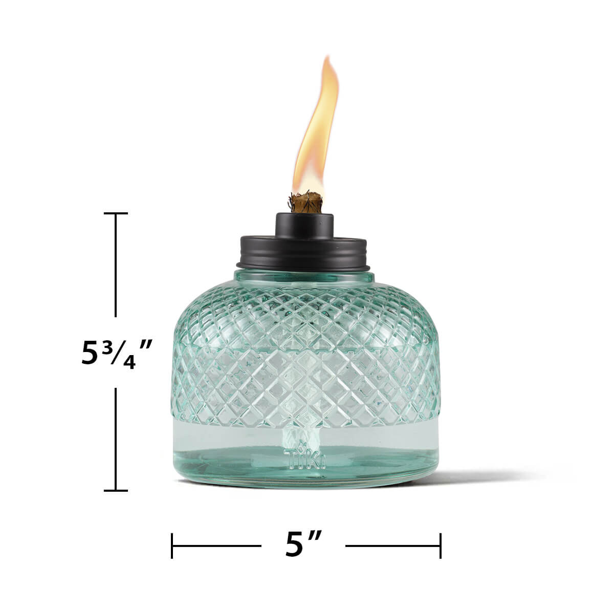 A 5.75" tall, 5" wide TIKI glass table torch with a diamond pattern and visible flame.