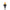 Black metal TIKI® torch with decorative cutouts, shown lit with a bright flame against a white background.