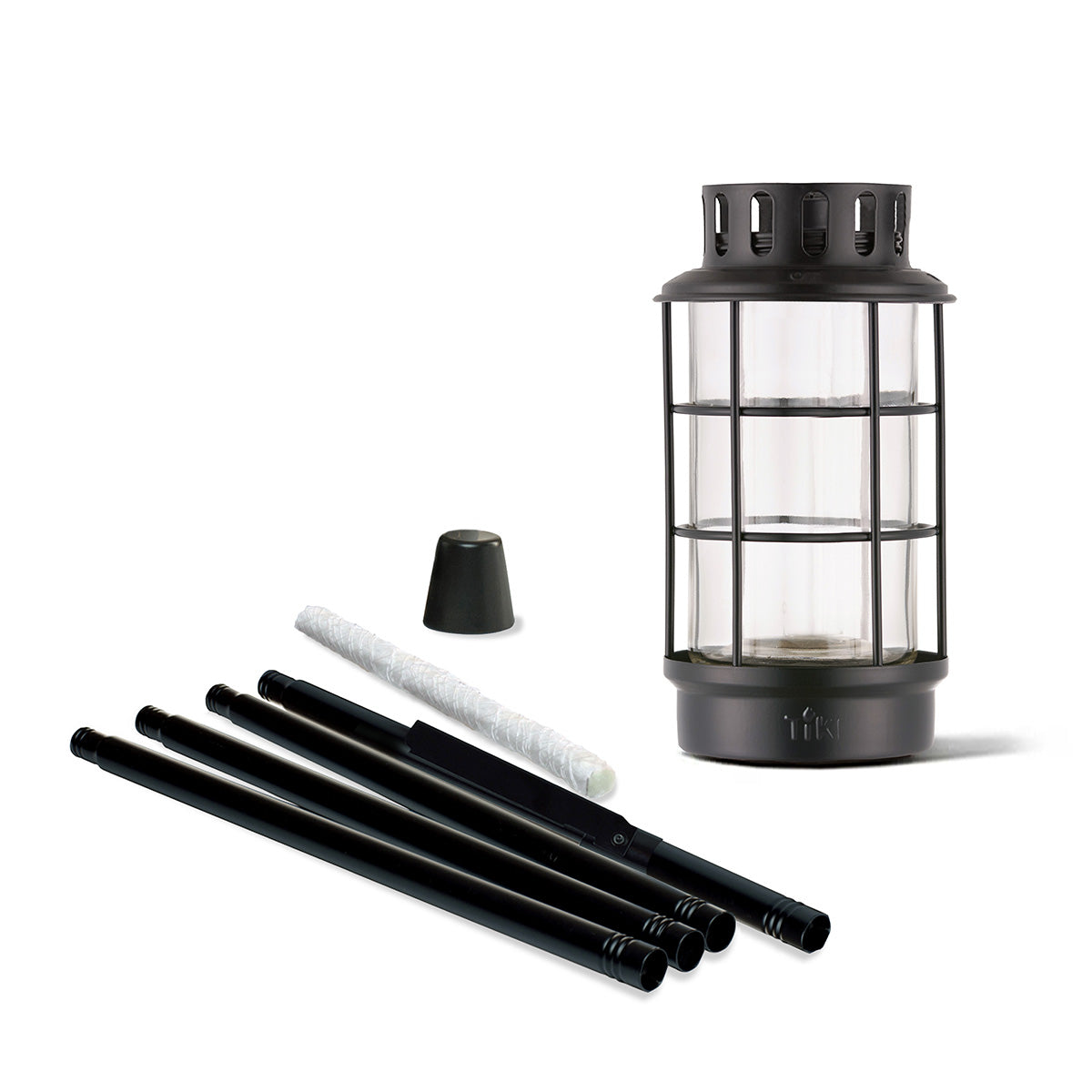 Black metal TIKI torch kit with glass housing, four pole pieces, wick, and snuffer cap for outdoor lighting.