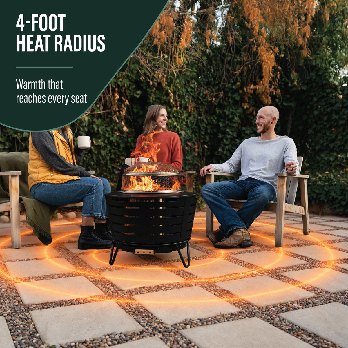 Outdoor fire pit with a 4-foot heat radius, black metal design, provides warmth to all seats around it.