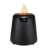 Black TIKI propane fire pit with visible flame and lava rocks, designed for outdoor patio use.