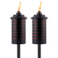 Two black TIKI Brand outdoor torches with modern slatted design, each lit with a visible flame.