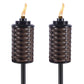 Two brown woven TIKI torches with flames, designed for outdoor lighting and ambiance.