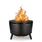Black metal outdoor fire pit with perforated sides, three legs, and visible flames rising from the top.