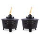 Two black TIKI® patio torches with visible flames, designed for outdoor tabletop use.