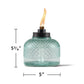 A 5.75" tall, 5" wide TIKI glass table torch with a diamond pattern and visible flame.