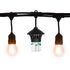 Outdoor string lights with a black mosquito repellent diffuser in the center, designed for patios and backyards.