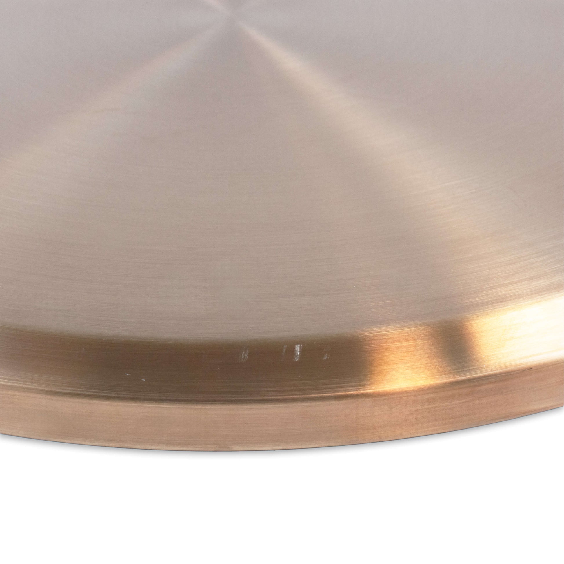 Close-up of a brushed metal TIKI torch base with a smooth, circular design and subtle gold finish.